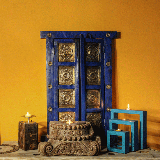 Hand-carved reclaimed wooden candle stand with rustic finish Hand-carved reclaimed wooden candle stand with rustic finish