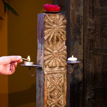 Antique wooden hand-carved candle stand with dark polish and iron base Antique wooden hand-carved candle stand with dark polish and iron base