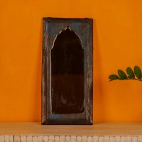 Handcrafted mirror frame made from reclaimed wood with natural textures and a rustic finish.