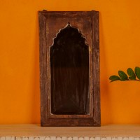 Wooden mirror frame in reclaimed wood with a natural distressed finish, suitable for rustic interiors.