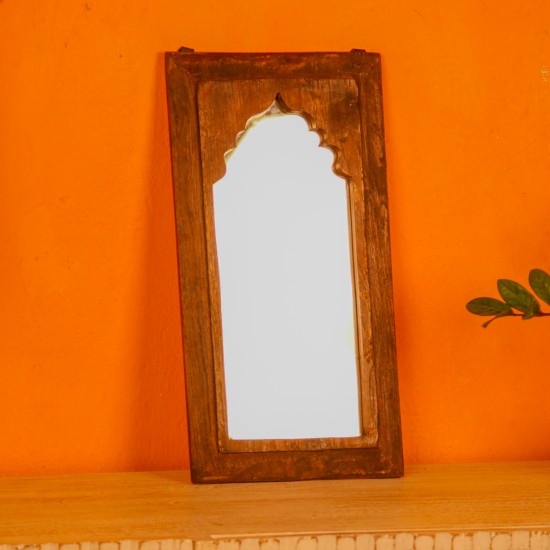 Wooden mirror frame in reclaimed wood with a natural distressed finish, suitable for rustic interiors.