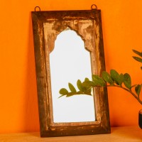 Handcrafted mirror frame made from reclaimed wood with natural textures and a rustic finish.