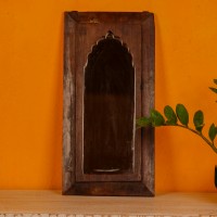 Wooden mirror frame in reclaimed wood with a natural distressed finish, suitable for rustic interiors.