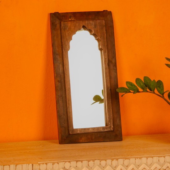 Wooden mirror frame in reclaimed wood with a natural distressed finish, suitable for rustic interiors.