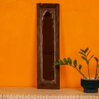 Handcrafted mirror frame made from reclaimed wood with natural textures and a rustic finish.