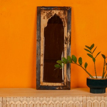 Wooden mirror frame crafted from reclaimed wood showcasing unique grains and an aged finish.