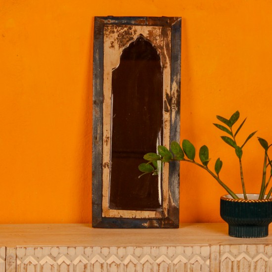 Wooden mirror frame crafted from reclaimed wood showcasing unique grains and an aged finish.