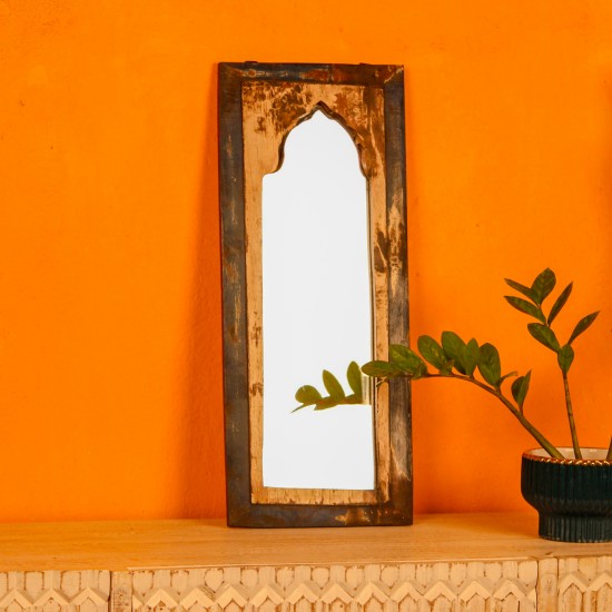 Wooden mirror frame crafted from reclaimed wood showcasing unique grains and an aged finish.