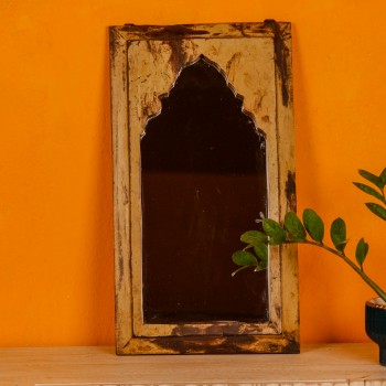 Handcrafted mirror frame made from reclaimed wood with natural textures and a rustic finish.