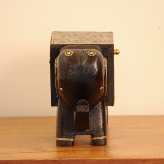 Dark wooden elephant-shaped decorative box with gold detailing and four sturdy legs.