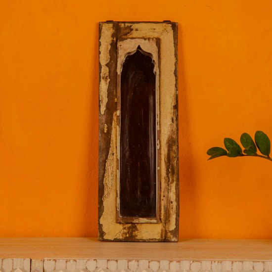 Handcrafted mirror frame made from reclaimed wood with natural textures and a rustic finish.