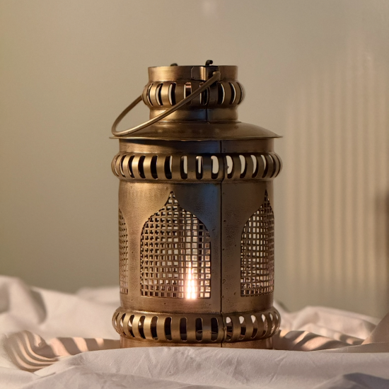 Handmade iron Gajra lantern in golden matte finish with intricate perforated design, suitable for wall-mounted ambient lighting