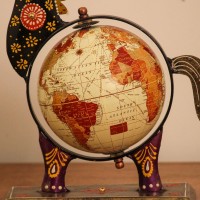 Hand Painted Horse Globe Desk Décor – Styled on Desk Hand-painted horse globe styled on a wooden desk as colourful desk décor