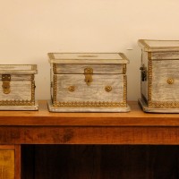 Set of 3 Distressed Grey Wooden Jewellery Box with Brass Work Set of 3 wooden jewellery box in distressed grey finish featuring embossed brass detailing and decorative hardware