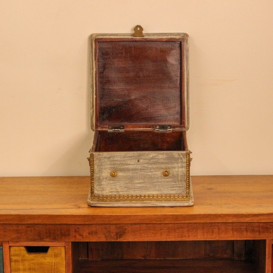 Small Distressed Grey Wooden Jewellery Box with Brass Work Small wooden jewellery box in distressed grey finish featuring embossed brass detailing and decorative hardware