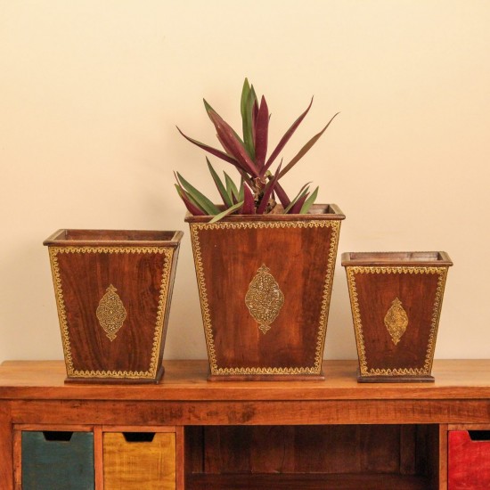 Set of 3 Wooden Planter Pot with Brass Embossed Detailing Brown polished wooden planter pot featuring intricate brass embossed border and handcrafted detailing