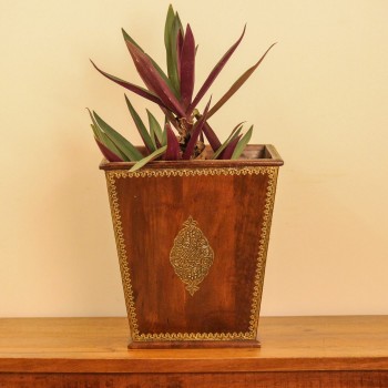 Large Wooden Planter Pot with Brass Embossed Detailing Brown polished wooden planter pot featuring intricate brass embossed border and handcrafted detailing