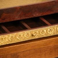 Wooden Serving Tray with Brass Embossing and Drawer Polished wooden tray featuring brass embossed surface and an integrated storage drawer