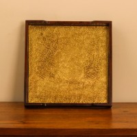 Square Wooden Tray with Brass Embossed Surface Square shaped wooden tray with polished edges and intricate brass embossed design