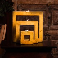 Yellow square tea-light holder set of 3 – decorative candle stands front view Yellow square tea-light holder set of 3 – decorative candle stands front view