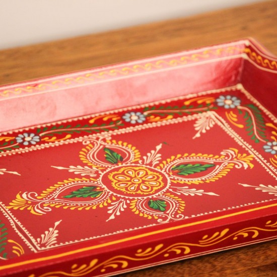 Hand Painted Red Wooden Tray – Small (12" x 8") – Front View Hand painted Red coloFront view of a small 12 x 8 inch hand-painted red wooden serving tray with floral centre motifred wooden tray - Small