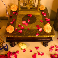 Wooden Square Pooja Chorang Embossed Brass Art (15 x 15 x ht 6 Inches) "Wooden square pooja chowki with brass embossing adorned with flowers and diya for festive decor