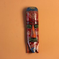 Hand Painted Tribal Face Mask – Maroon Mandala Hand-carved wooden tribal face mask in an elongated form, hand painted in maroon with a mandala-bordered crown, green eyes, and fine white floral detailing.