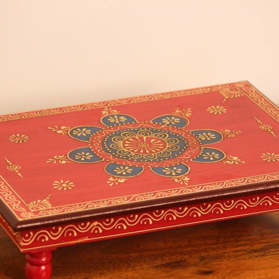 Hand Painted Mandala Chowki – Red, Large Large wooden chowki hand painted in red with a detailed mandala centrepiece in blue and gold, bordered by fine floral and paisley motifs along the edges.