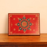 Hand Painted Mandala Chowki – Red, Large Large wooden chowki hand painted in red with a detailed mandala centrepiece in blue and gold, bordered by fine floral and paisley motifs along the edges.