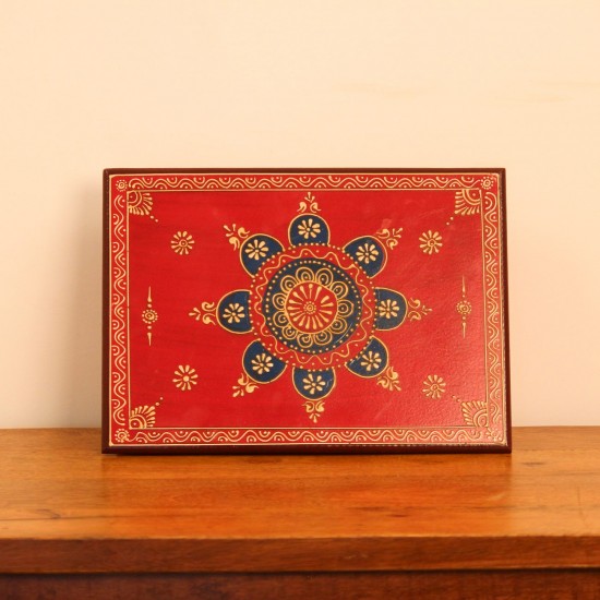 Hand Painted Mandala Chowki – Red, Large Large wooden chowki hand painted in red with a detailed mandala centrepiece in blue and gold, bordered by fine floral and paisley motifs along the edges.