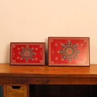 Hand Painted Mandala Chowki – Red, Large Large wooden chowki hand painted in red with a detailed mandala centrepiece in blue and gold, bordered by fine floral and paisley motifs along the edges.