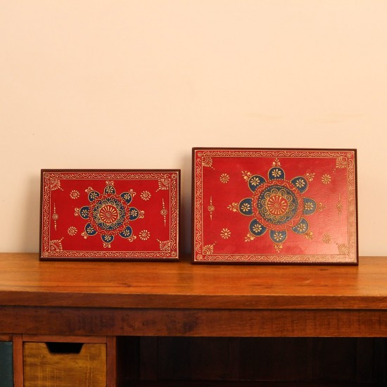 Hand Painted Mandala Chowki – Red, Large Large wooden chowki hand painted in red with a detailed mandala centrepiece in blue and gold, bordered by fine floral and paisley motifs along the edges.