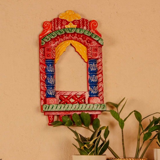 Colorful handpainted wooden jharokha frame with red, blue, and yellow detailing, inspired by traditional Indian architecture.