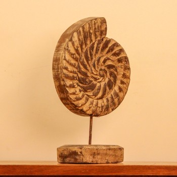 Carved wooden spiral block on stand styled on a console as table décor