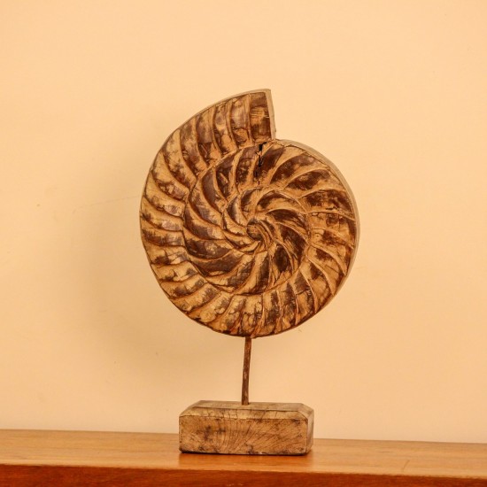 Carved wooden spiral block on stand styled on a console as table décor