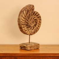 Carved wooden spiral block on stand styled on a console as table décor