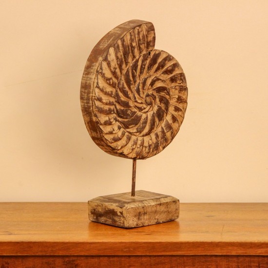 Carved wooden spiral block on stand styled on a console as table décor