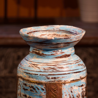 Distressed blue wooden pot – rustic wooden planter with worn blue finish front view Distressed blue wooden pot – rustic wooden planter with worn blue finish front view