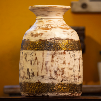 White distressed wooden matka with embossed brass work – rustic wooden pot front view