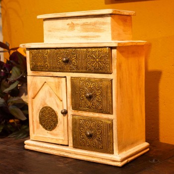 White wooden chest of drawers with hand brass work White wooden chest of drawers with hand brass work