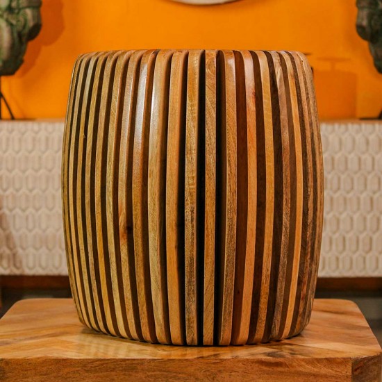 Handcrafted spiral slatted wooden stool with natural wood finish used as side table or accent stool
