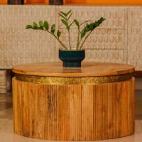 Round fluted wooden coffee table embossed brass strip ethnic Indian furniture