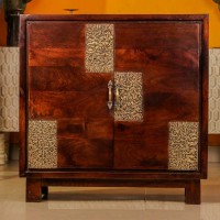 Premium dark wood two door cabinet with decorative embossed brass panels on the front
