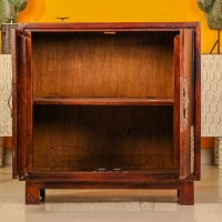 Premium dark wood two door cabinet with decorative embossed brass panels on the front