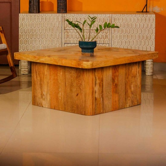 Large wooden coffee table with chevron pattern top and natural wood finish