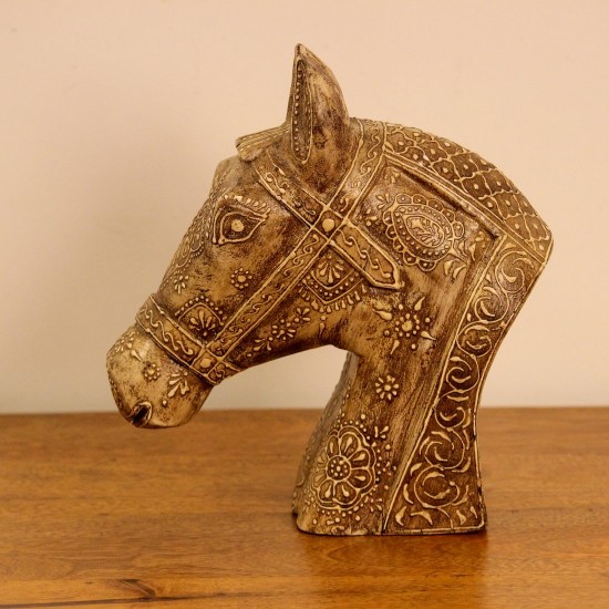 Antique Carved Horse Head Styled on Shelf Antique-finish carved horse head styled on a wooden shelf as a 10 inch tabletop accent.