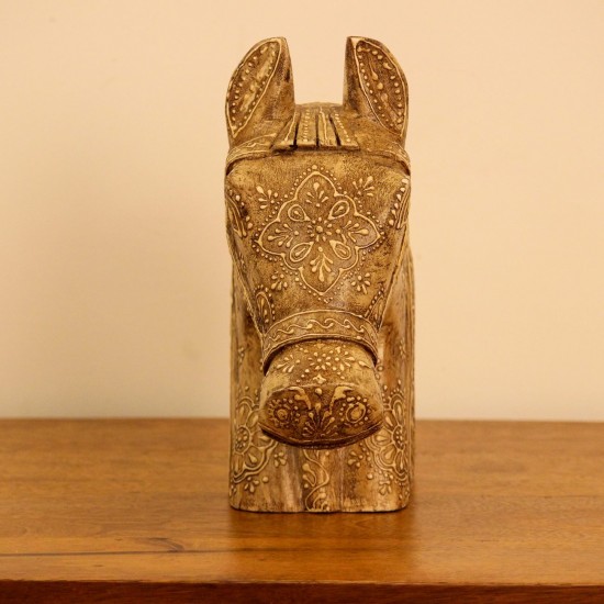 Antique Carved Horse Head Styled on Shelf Antique-finish carved horse head styled on a wooden shelf as a 10 inch tabletop accent.