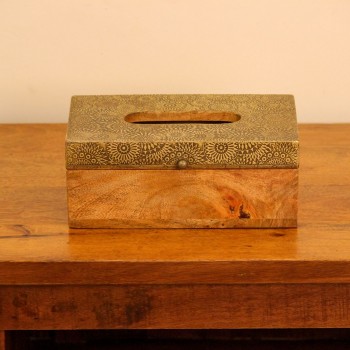 Brass Embossed Sunburst Tissue Box – Top View Top view of a wooden tissue box with a brass-embossed lid in a repeating sunburst and mandala pattern, with an oval dispensing cut-out at the centre.