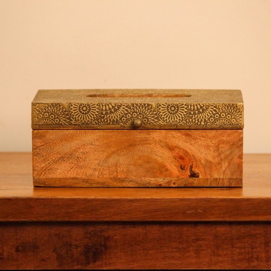 Brass Embossed Sunburst Tissue Box – Top View Top view of a wooden tissue box with a brass-embossed lid in a repeating sunburst and mandala pattern, with an oval dispensing cut-out at the centre.