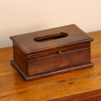 Natural Dark Polish Wooden Tissue Box – Angled View Angled view of a wooden tissue box in a dark natural polish, with an oval dispensing cut-out on the lid and a small brass knob on the front.